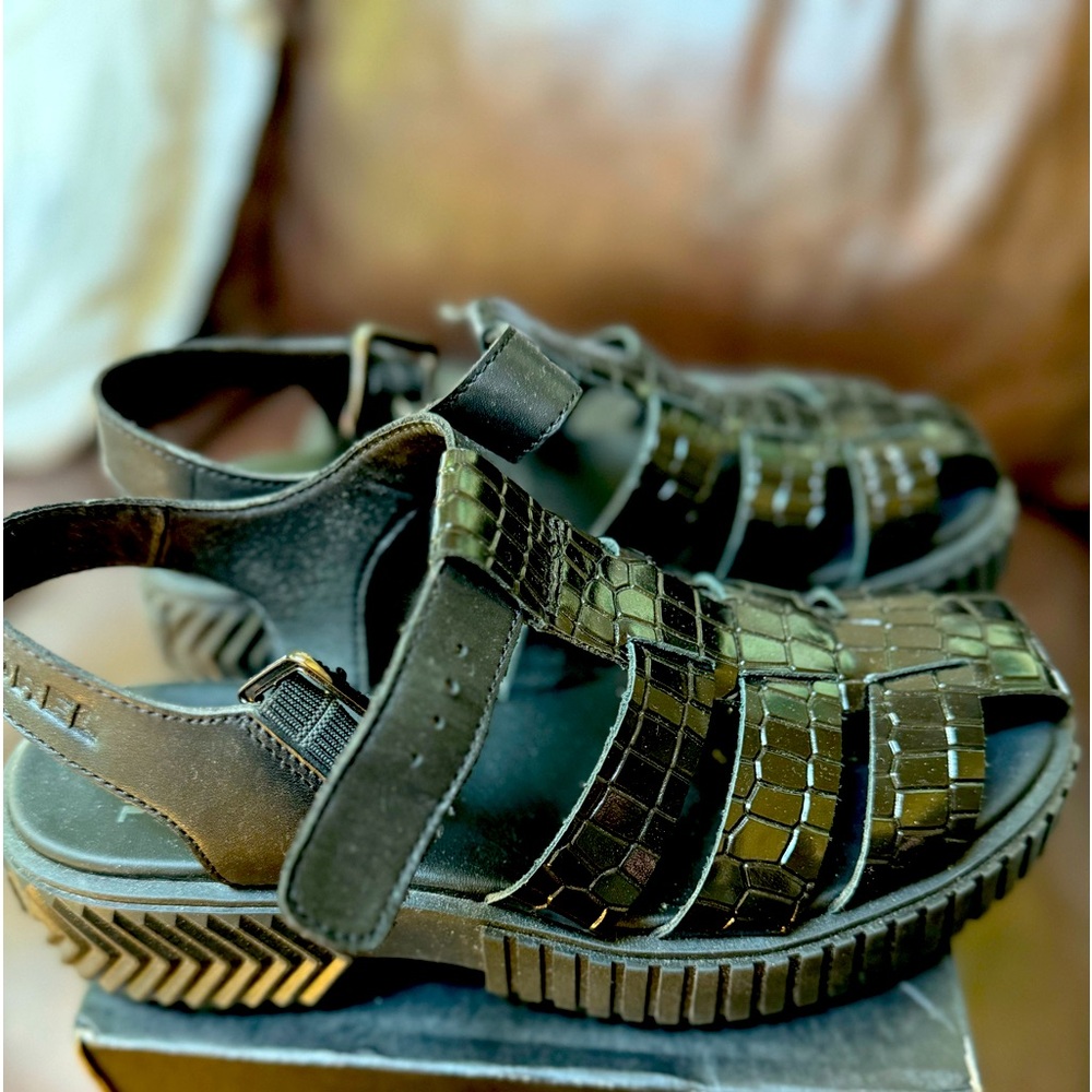 Worn only twice.  Fisherman Sandals by Sorel
